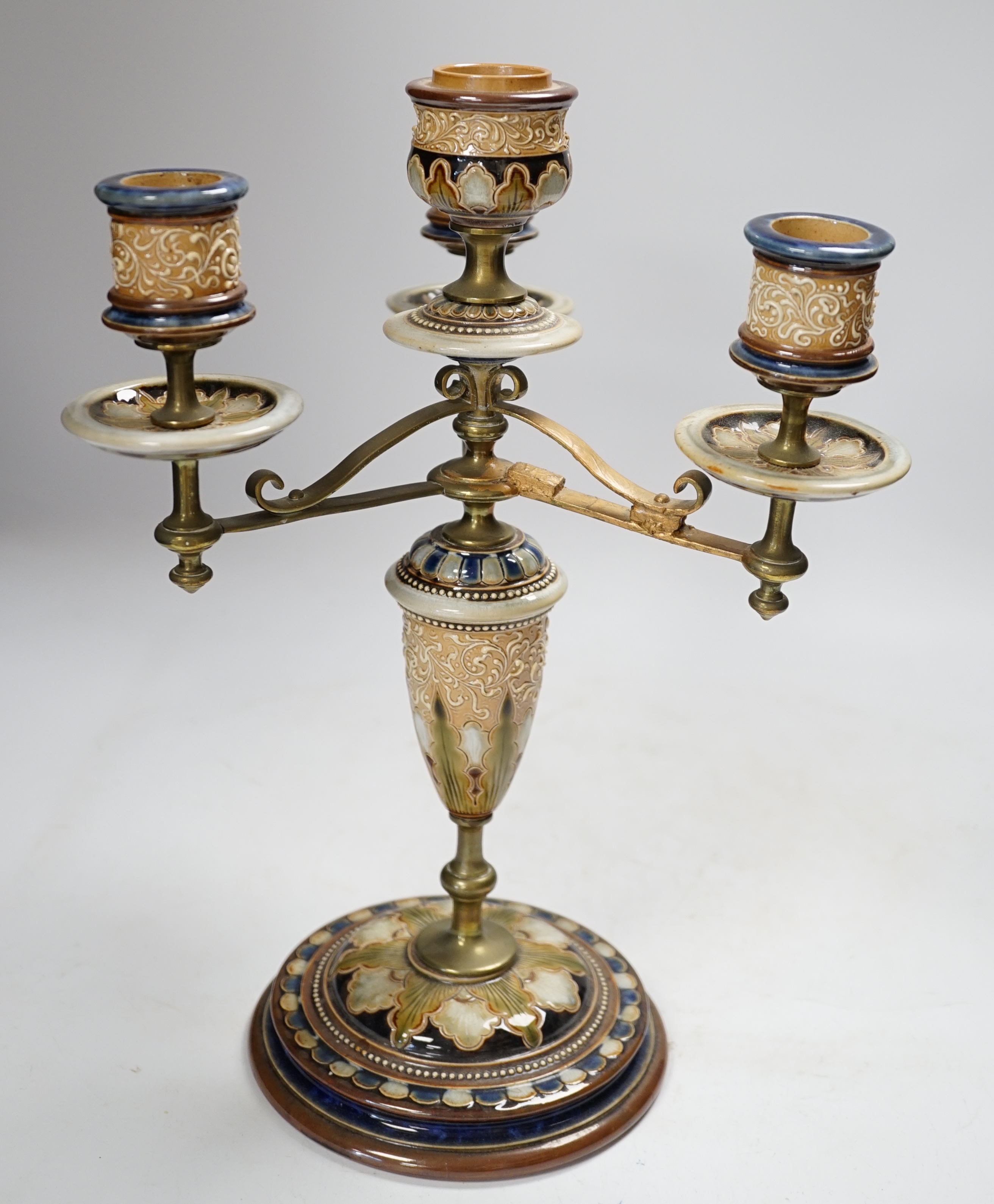 A Royal Doulton three branch four light candelabra, Eliza Simmance, 33cm high, Condition - poor to fair, one arm restored